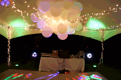 DJ package outdoor wedding reception with creative lighting