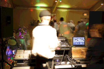DJ package outdoor wedding reception with creative uplighting